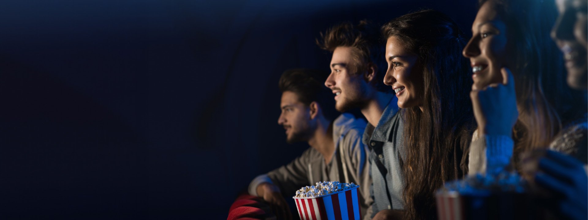 a group of people watching a movie